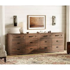 a large wooden dresser sitting in a living room