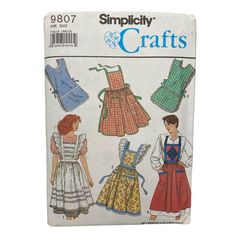 an old book with different patterns on the front and back cover, including aprons