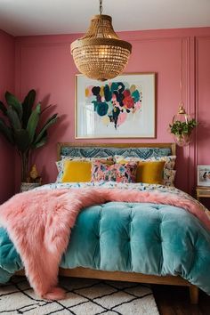 a bedroom with pink walls and blue bedding