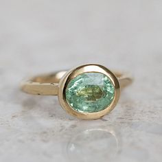 Our Ruins ring has been set with a natural, unheated Tourmaline. Tourmaline measures 9 x 7mm. Band width 2mm. Elegant Untreated Oval Emerald Ring, Oval Tourmaline Ring For May Birthstone, Oval Tourmaline Emerald Ring With Bezel Setting, Tourmaline Wedding Ring, Sarah Gardner, Green Tourmaline Ring, Future Engagement Rings, Wax Casting, Lost Wax Casting