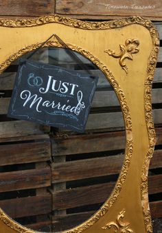 a mirror with a sign that says just married