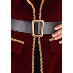 a close up of a person wearing a red and gold outfit with a black belt