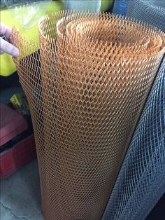 several pieces of wire mesh are stacked on top of each other