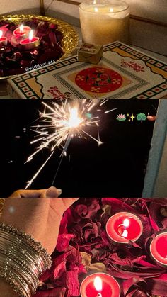 a person holding a sparkler in their hand next to some candles on a table