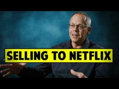 a man with glasses is holding his hands out and the words selling to netflix are in front of him