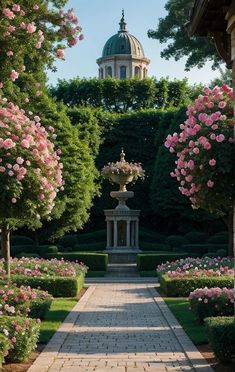 a garden with pink flowers and trees in the background, along with a walkway leading to a domed building