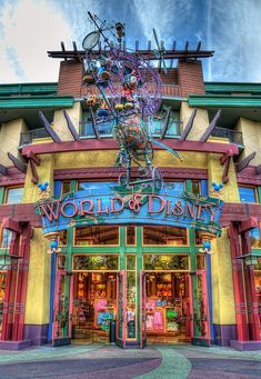 the world's largest disney store is located in front of an amusement park building