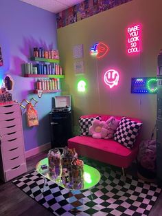 a living room filled with furniture and neon lights