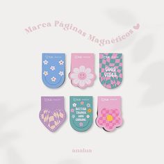 six magnets with flowers on them are in the shape of hearts and words that say, marca pagina magneticos