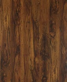 a close up view of the wood grains on this wooden flooring material, which is very dark brown