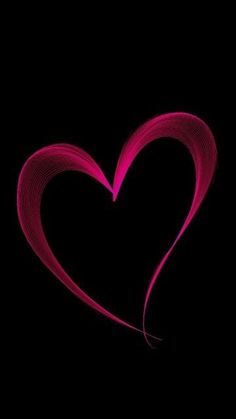 a pink heart on a black background