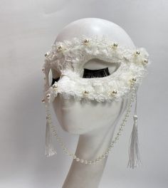 Pearl mask,White lace mask,tassel mask,Masquerade party mask,Beautiful mask,Court ball party,Dance mask,carnival masks,creative mask. Size: Adult size  Made of high-quality mild materials, comfortable to wear Usage scene: Halloween Carnival Party Mask,Christmas party, family party,Stage show, character playing,Clothing matching,cosplay, bar entertainment, carnival, festival ball party, birthday party, wedding party, costume ball, New Year party,live broadcast,school party，music festival, etc All Elegant Theater Masks For Halloween, Adjustable Masquerade Mask For Wedding Carnival, Full Face Masquerade Mask For Carnival Party, Venetian Full Face Masquerade Mask For Party, Adjustable Masks And Prosthetics For Carnival Party, Elegant Full Face Masquerade Mask For Carnival, Elegant Eye Mask For Theater, Elegant Theater Eye Mask, Carnival Party Full Face Mask