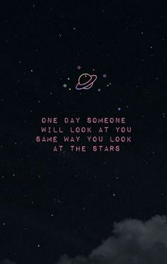 the words are written in pink and black on a dark background with stars above it