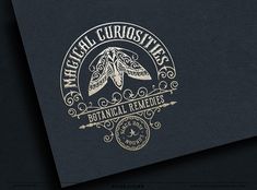 a black and gold business card with the words metal curiosity botanical remeds on it