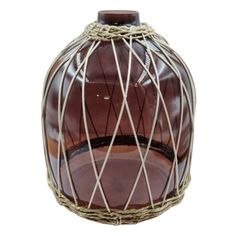 a brown vase with rope wrapped around it