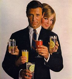 a man and woman are holding glasses with drinks