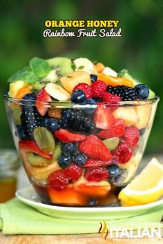 two small bowls filled with fruit and salad