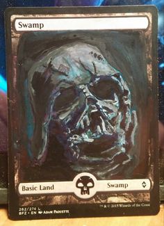 a card with a painting of a skull on it's face and the words swamp