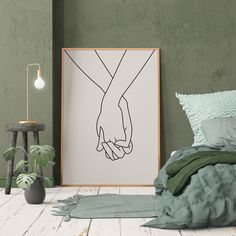 a black and white drawing of two hands holding each other in front of a green wall