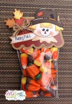 a bag filled with candy and candies on top of a table