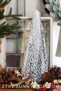 Looking for easy & cheap DIY Christmas Decor ideas? Try these simple finger knit trees. They can be made quickly. This cozy Christmas decor is perfect for the living room, bedroom or even the kitchen. Bonus video tutorial.