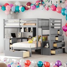 there is a bunk bed in the room with balloons