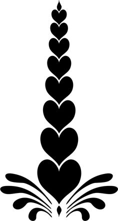 a black and white image of a plant with hearts on it's leaves, in the shape of a book