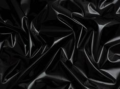 an image of black plastic material that looks like it could be used as a background