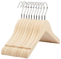 a wooden hanger with six pairs of hooks attached to the top and bottom of it