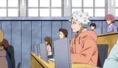 an anime scene with people sitting at desks and one person standing in front of the computer