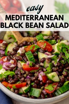 a bowl filled with black beans and vegetables