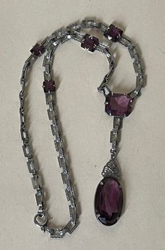 "Art Deco purple glass , amethyst glass, metal  filigree necklace  Excellent condition 1920-s.  15.25\" with clasp, center part  drop - 2 3/16\" x 5/8\"  09/12/22 00830" 1920s Jewelry Necklace, Purple Necklace Aesthetic, Purple Accessories Aesthetic, Thrifted Jewelry, Purple Glasses, Purple Accessories, Center Part, Filigree Necklaces, Necklace Purple