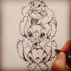 a drawing of some cartoon characters in the middle of their face, with one being drawn