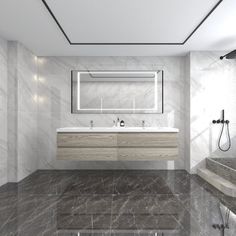 a large bathroom with marble floors and walls