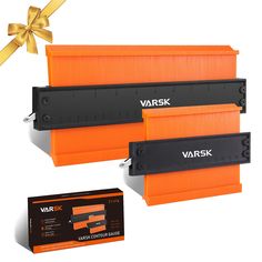 three orange boxes with black labels and a gold ribbon around them, both are labeled varsk