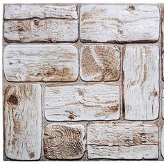 an old white brick wall made out of wood planks, with peeling paint on it