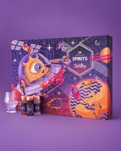 the box contains three bottles of spirit's toothbrushes and two shot glasses