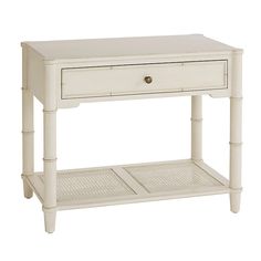 a white wooden table with drawers on one side and an open drawer on the other