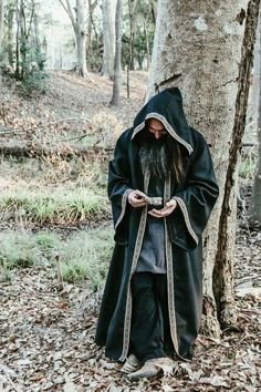 Our Celtic Robe is a great costume accessory for anyone filling out a Wizard, Warlock, Medieval, Fantasy, or Renaissance costume. Great for cosplay or LARP event. Each robe is made from 100% polyester knit fabric with jacquard trim. Robes are designed with large hoods and sleeves for dramatic affect. Black Robe with Tan/Black Trim Brown Robe with Black/Tan Trim Tan Robe with Beige/Tan Trim Gray Robe with White/Gray Trim White Robe with Beige/Tan Trim #warriorsoul #medieval #fantasyphotography Medieval Outerwear For Halloween Cosplay, Viking Costume For Halloween And Fantasy Events, Medieval Outerwear For Halloween Costume Party, Medieval Cosplay Costume For Winter Costume Party, Elvish Cosplay Costume For Winter, Elvish Winter Costume For Larp, Elvish Costume For Larp, Elvish Winter Costumes For Fantasy Events, Black Medieval Festival Cosplay Costume