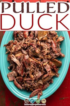 pulled duck on a blue plate with the title pulled duck in red and white text