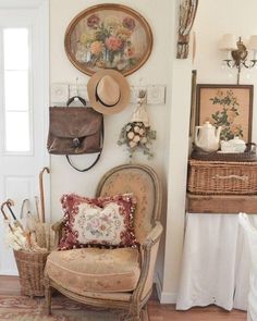 there is a chair in the room with hats on it and other items hanging on the wall