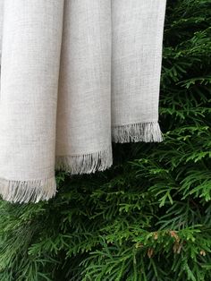 "Beautiful Natural linen color linen scarf with fringes. This natural linen color scarf is lightweight and soft and made from 100% pure linen. Stylish fashion trend for men or women outfit. It will not shrink, because it is pre-washed in 40o water. Adorable wrinkle. Edges are frayed for more casual look and fixed to prevent further fraying. Dimensions: approximately 18\" wide x 78\" long [45 x 200 cm] Care instructions: - gentle wash cycle - preferably lukewarm water - straighten and hang to dry Beige Bohemian Cotton Scarf, Casual Green Handmade Scarf, Bohemian Beige Linen Scarf, Bohemian Hand-dyed Scarves For Spring, Green Hand Dyed Bohemian Scarf, Boho Scarf, Linen Scarf, Damen Outfit, Women Scarf