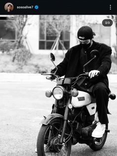 a man riding on the back of a motorcycle