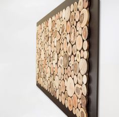 a large piece of wood is mounted on the wall