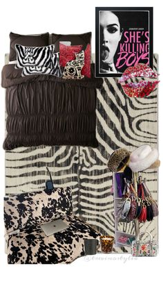 there is a zebra print bed spread with shoes and purses on the shelf next to it