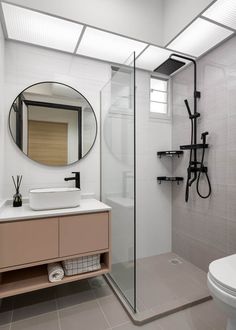 a bathroom with a sink, mirror and shower stall in the middle of the room