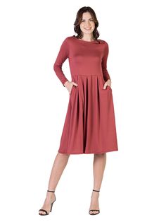 A fall wardrobe must have. This midi dress for women is great for any occasion whether casual or dressy. Featuring a round neckline, long sleeves, midi length hemline, pleated waist, and pockets for a finishing touch. Pair this fit n flare dress with ballet flat for a casual look or create a dressy look with heels. Available in nine beautiful color options, youll want one in every color. Made from a soft and comfortable stretch material that is machine washable for easy care. material: 92% Polye Midi Dress For Women, Rust Dress, Review Dresses, Women Midi, Fit N Flare Dress, Pocket Dress, Ballet Flat, Fall Wardrobe, Dress For Women