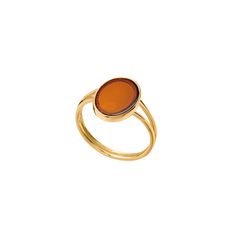 Baltic amber is a stone of happiness and creativity. It's a reminder of warm summer days and a refreshing sea breeze. Put this ring on and enjoy its sunny beauty.  The ring is made of brass, plated with 24-carat gold.  Size of the amber: 14mm length / 10 mm width. The ring was created in a jewellery workshop in Tricity, Poland. The stones which we use are unique. They may differ in colour shading and inclusions in each jewellery piece. The product is nickel-free. Natural stones and precious meta Elegant Oval Amber Rings, Elegant Amber Oval Rings, Elegant Brown Gemstone Signet Ring, Formal Amber Oval Cabochon Rings, Elegant Amber Cabochon Ring, Oval Amber Cabochon Ring, Amber Oval Cabochon Rings, Elegant Amber Citrine Ring, Modern Amber Oval Ring