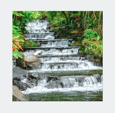 a jigsaw puzzle with a waterfall in the background