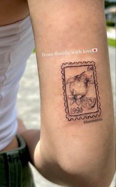 a woman's arm with a stamp on it